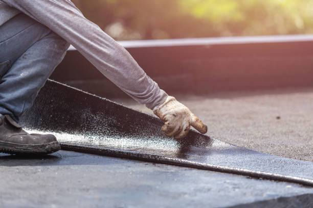 Professional Basement Waterproofing technician working in Terryville, CT